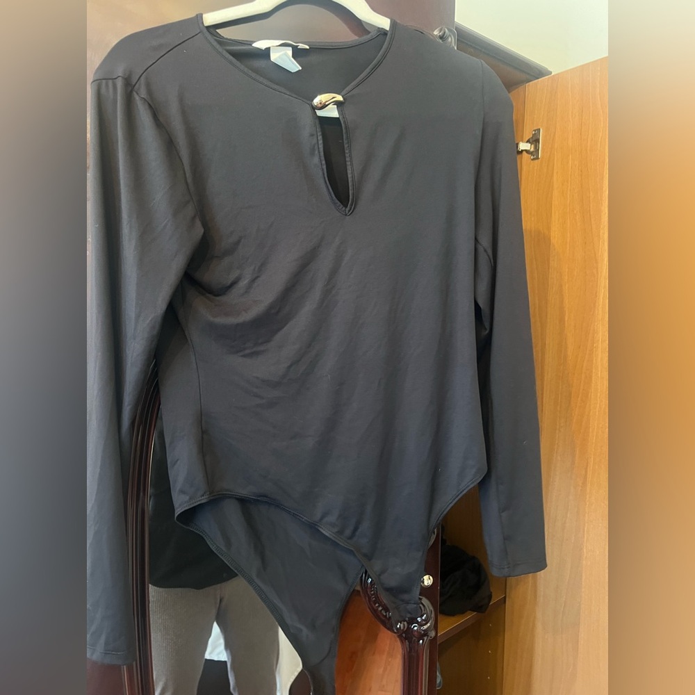 Women’s black top. Worn once. Fun and simple